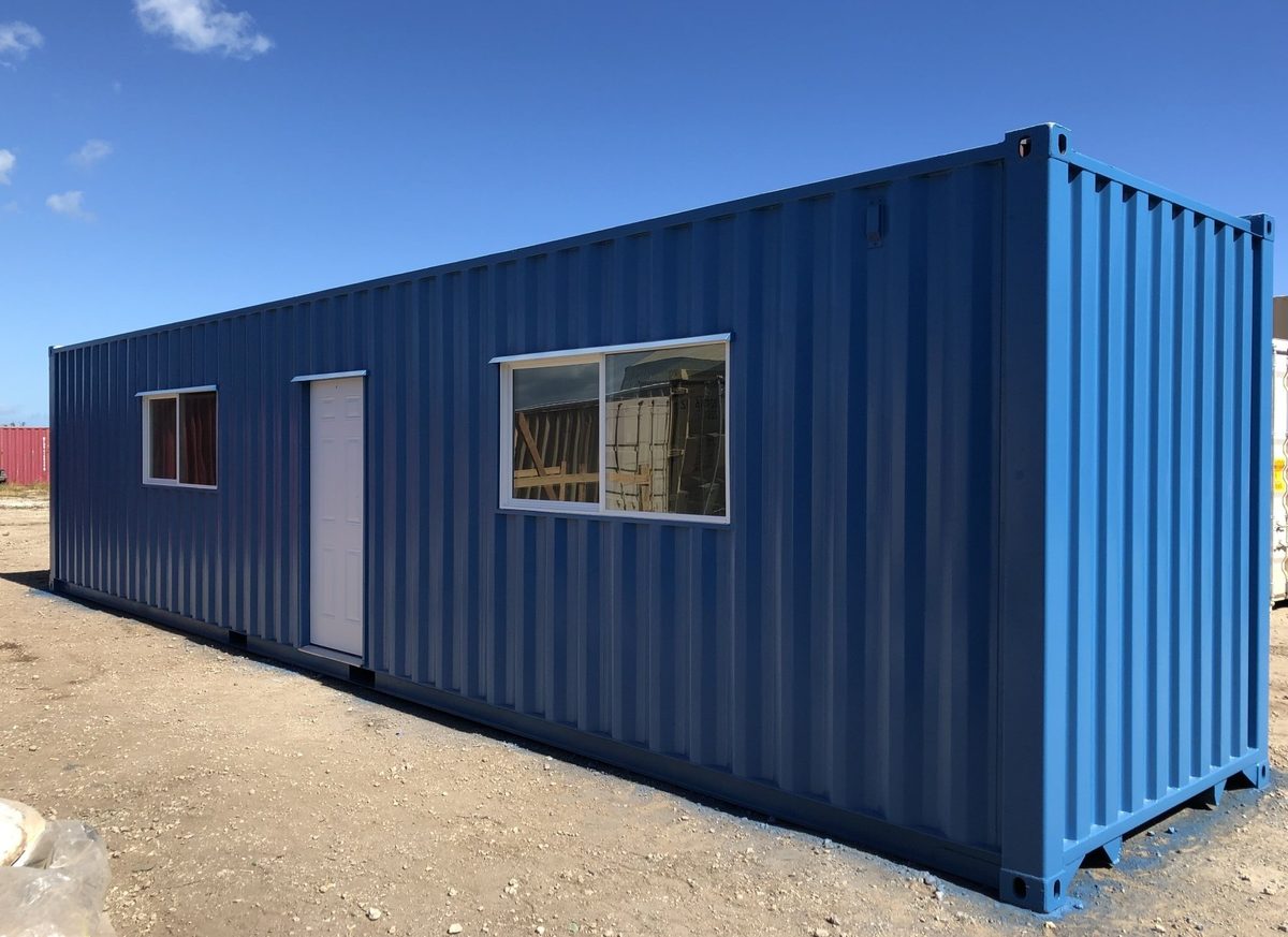 Ground-level container office with door and windows